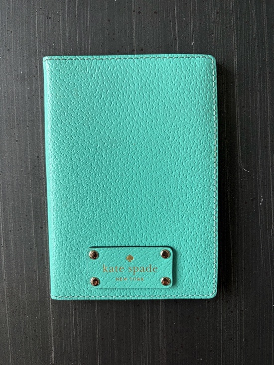 kate spade Handbags - Kate Spade Turquoise Leather Passport Cover with Gold Logo Plate: see photos